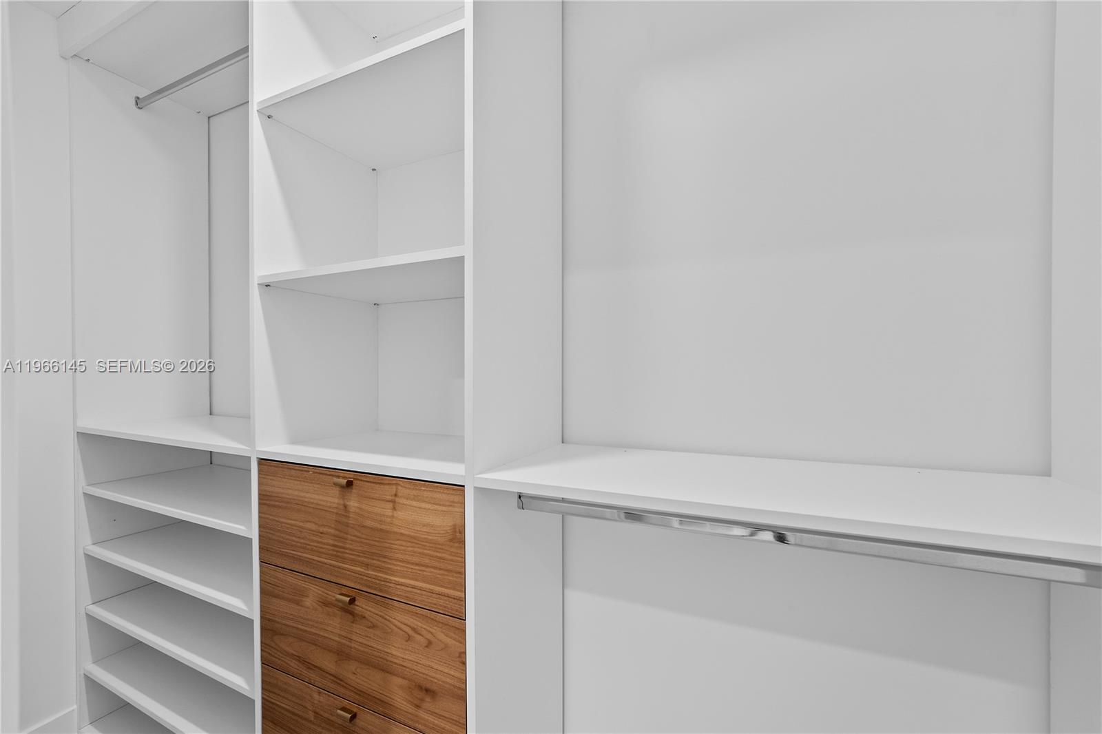 1420 Southwest 17th Street Miami, FL 33145 - Photo 30 of 49 a close view of walk in closet with empty racks