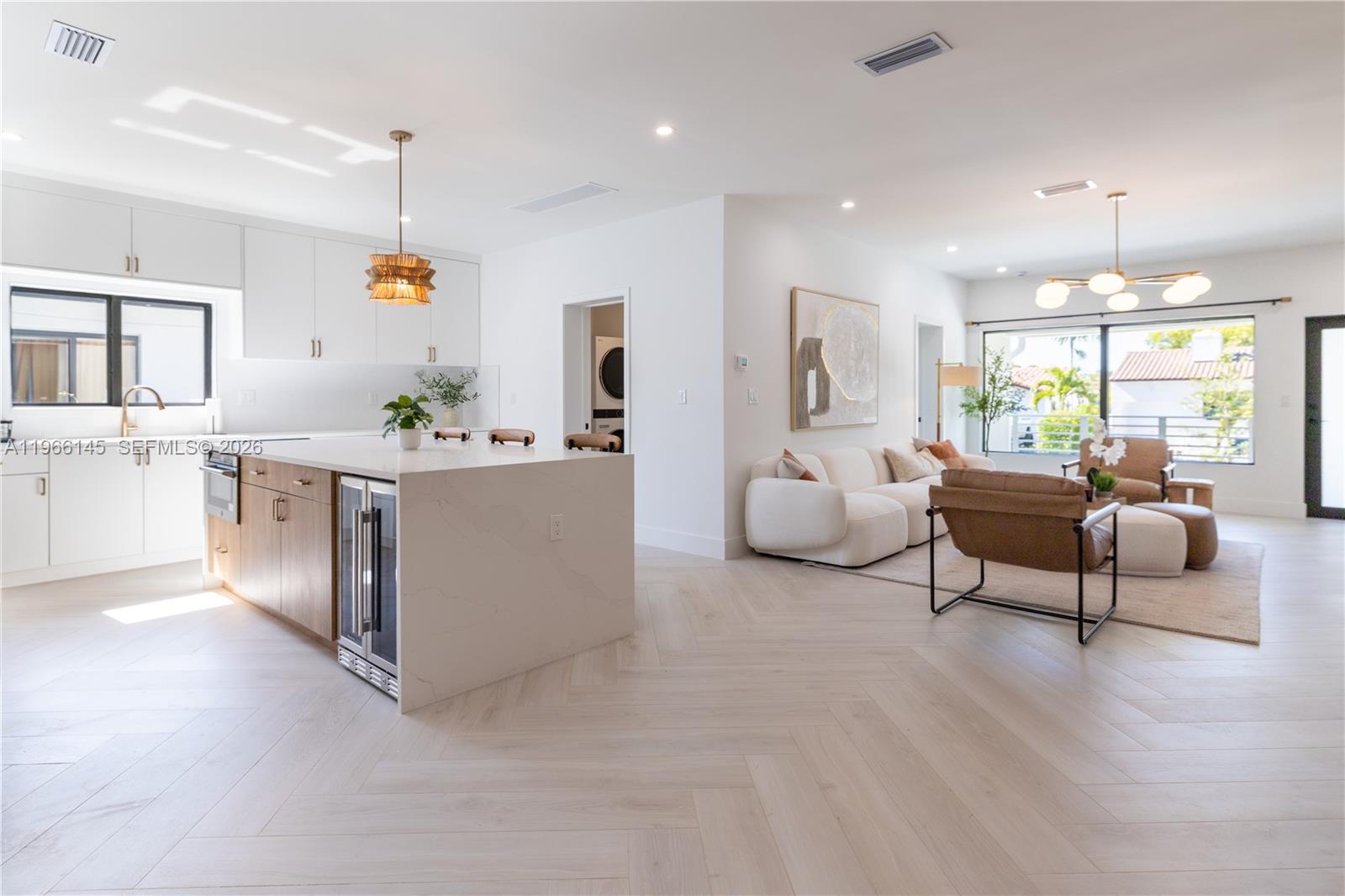 1420 Southwest 17th Street Miami, FL 33145 - Photo 3 of 49 a living room with furniture and kitchen view