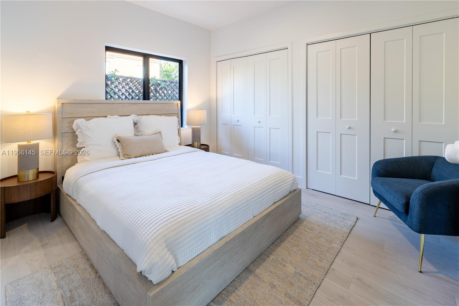 1420 Southwest 17th Street Miami, FL 33145 - Photo 32 of 49 a bedroom with a bed and a couch