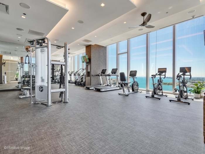363 East Wacker Drive, Unit 4801 Chicago, IL 60601 - Photo 34 of 36 a view of a room with gym equipment