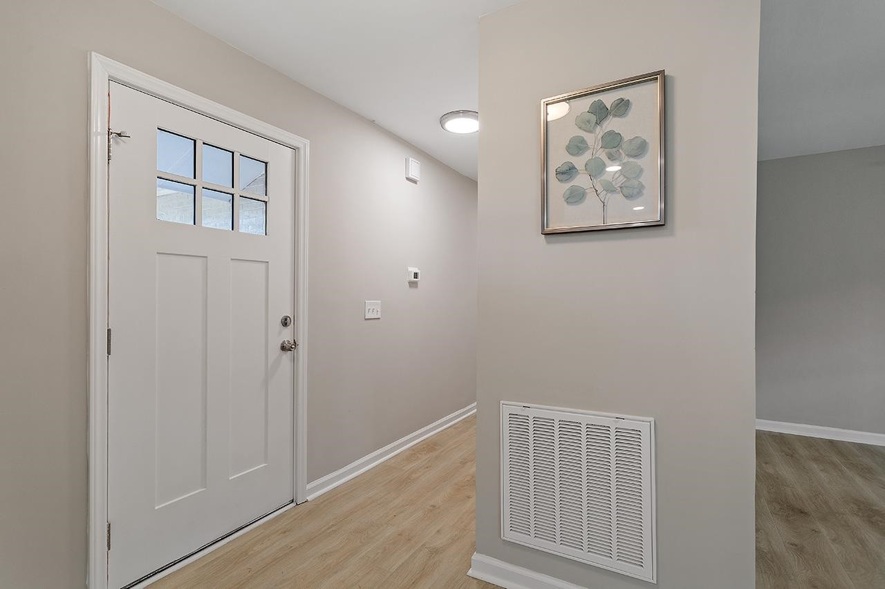3420 Blue Ridge Road Raleigh, NC 27607 - Photo 19 of 36 a view of room with window and hallway