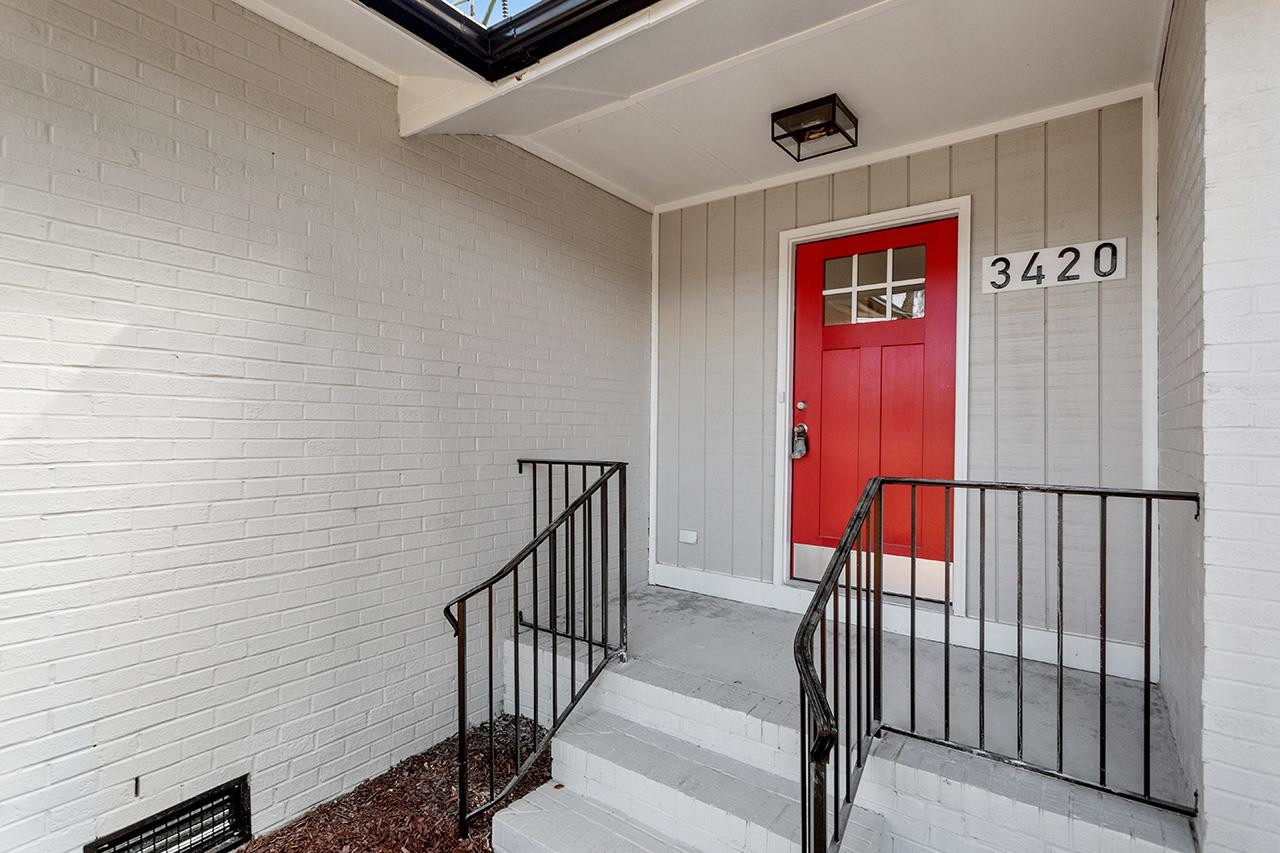 3420 Blue Ridge Road Raleigh, NC 27607 - Photo 29 of 36 a view of a hallway with a elevator