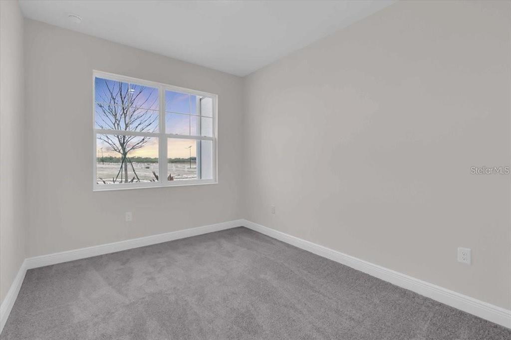 9258 Gulf Haven Drive Palmetto, FL 34221 - Photo 13 of 29 an empty room with a window