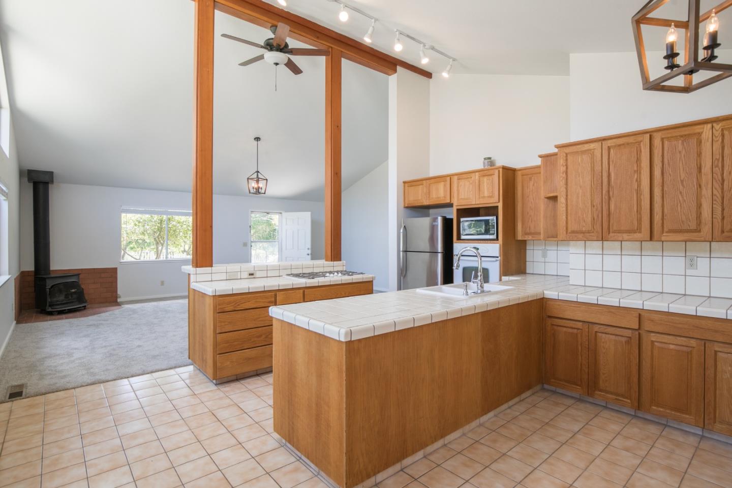 73 Webb Road Watsonville, CA 95076 - Photo 6 of 17 a kitchen with stainless steel appliances granite countertop a sink and a cabinets