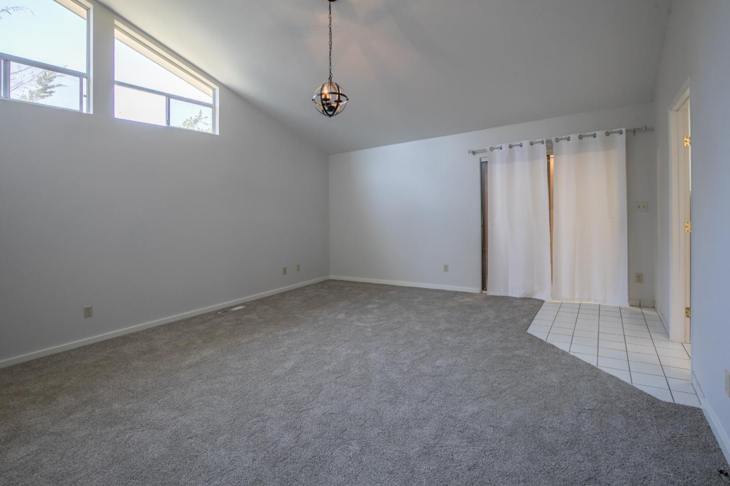 73 Webb Road Watsonville, CA 95076 - Photo 10 of 17 a view of an empty room with a window