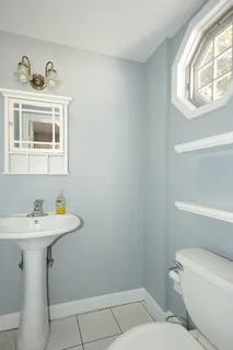 a bathroom with a sink and a toilet