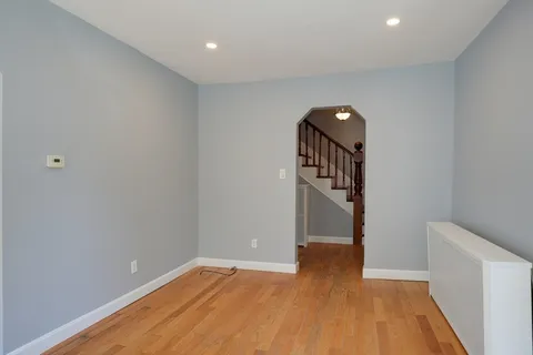 a view of a livingroom with wooden floor