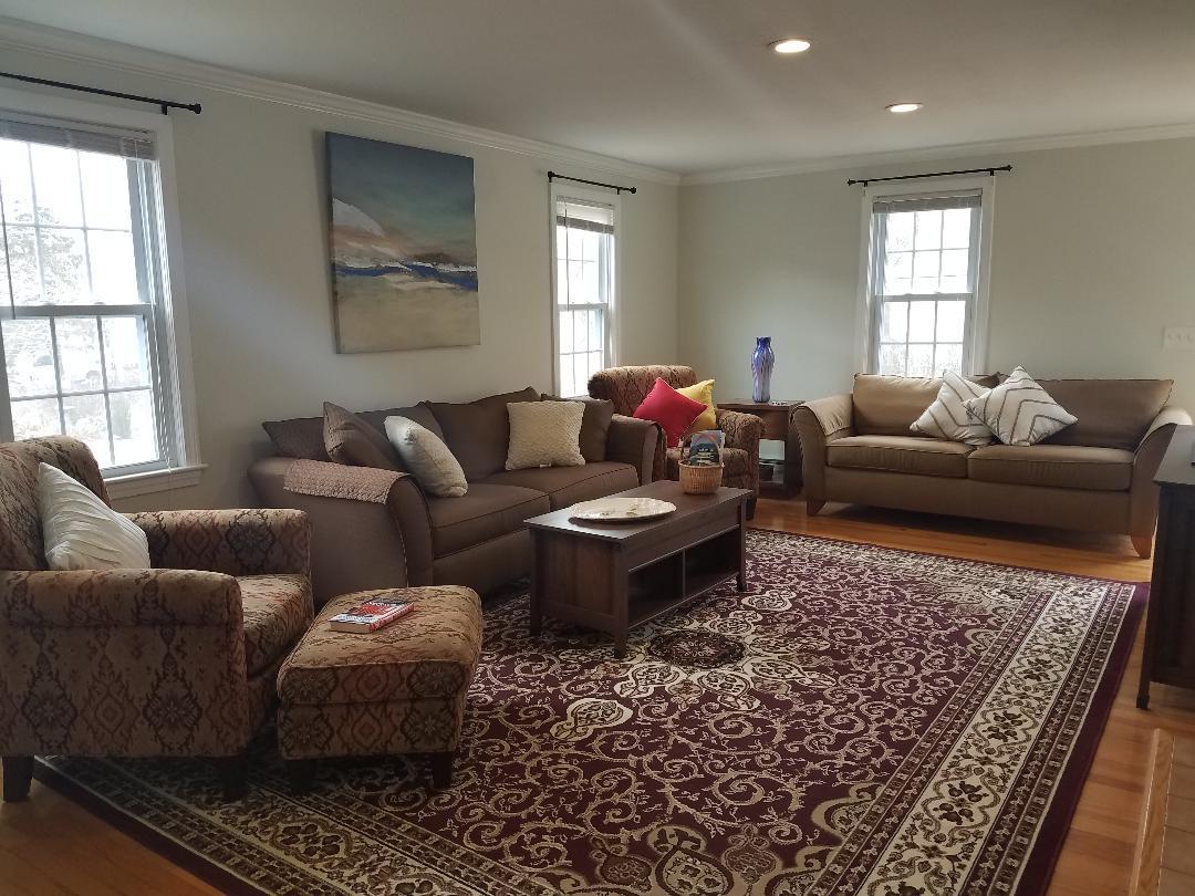 129 Elliott Road Centerville, MA 02632 - Photo 7 of 33 a living room with furniture and a window