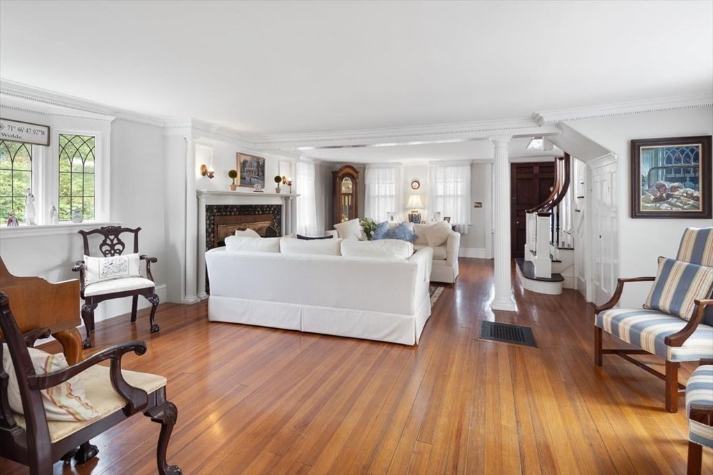 604 First Parish Road Scituate, MA 02066 - Photo 19 of 39 a living room with furniture and a fireplace