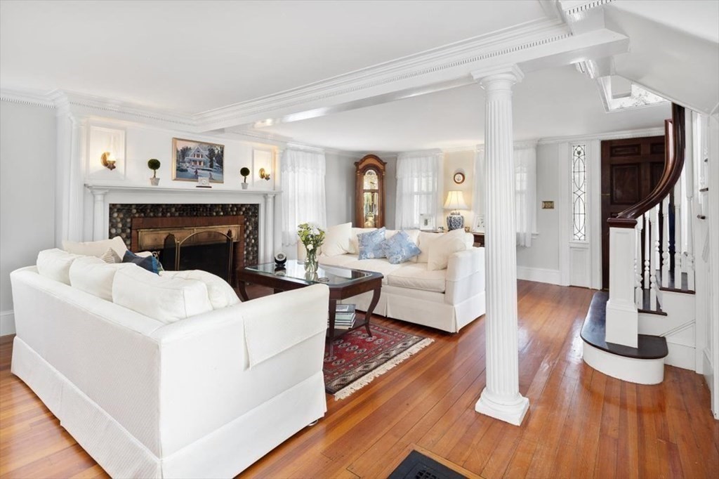 604 First Parish Road Scituate, MA 02066 - Photo 20 of 39 a living room with furniture large window and wooden floor