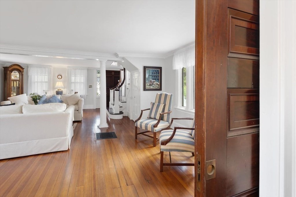 604 First Parish Road Scituate, MA 02066 - Photo 21 of 39 a living room with furniture a wooden floor and next to a window