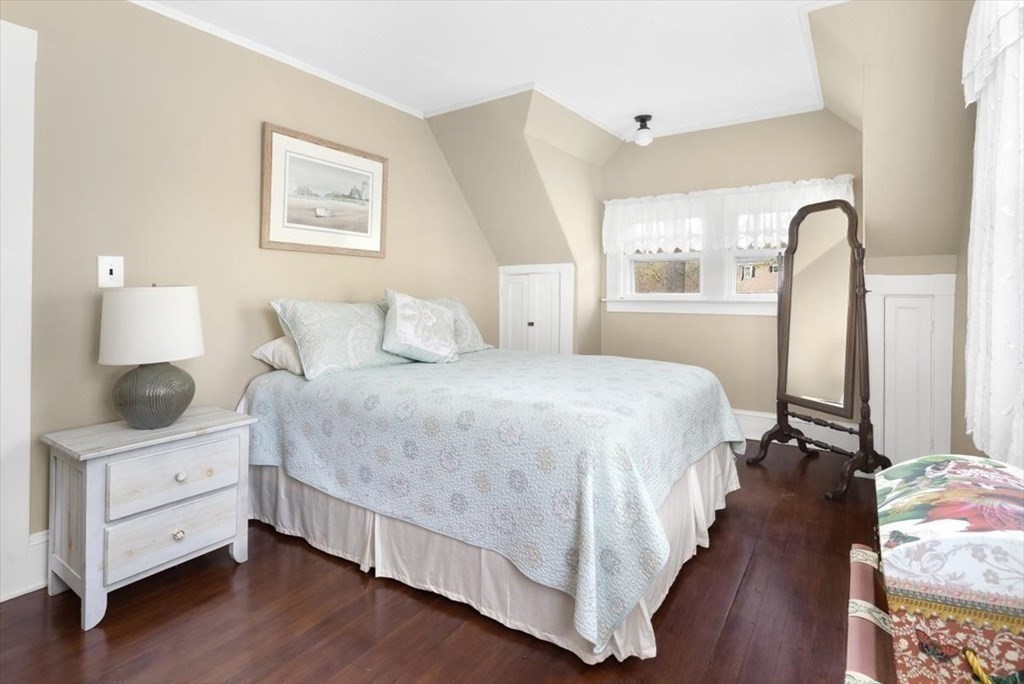 604 First Parish Road Scituate, MA 02066 - Photo 31 of 39 a bedroom with a bed and a window