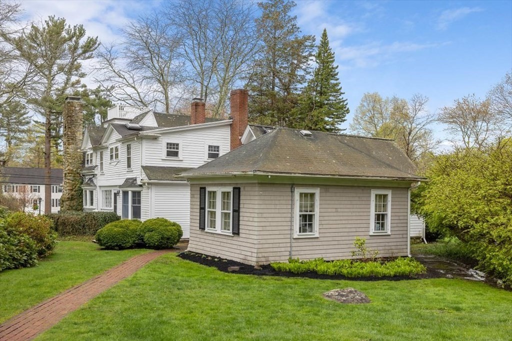 604 First Parish Road Scituate, MA 02066 - Photo 35 of 39 a view of a house with a backyard