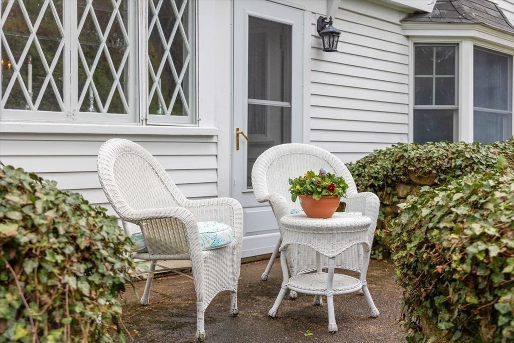 604 First Parish Road Scituate, MA 02066 - Photo 8 of 39 a view of a chairs and table in a patio