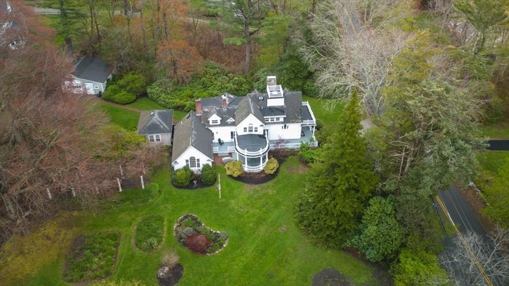 604 First Parish Road Scituate, MA 02066 - Photo 9 of 39 a backyard of a house with lots of green space and garden