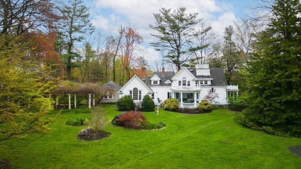 604 First Parish Road Scituate, MA 02066 - Photo 10 of 39 a front view of a house with garden