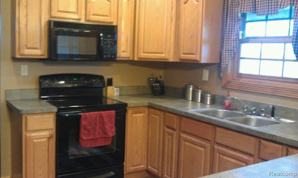 5782 Cade Road Imlay City, MI 48444 - Photo 4 of 15 5782 Cade-- Kitchen 2.JPG