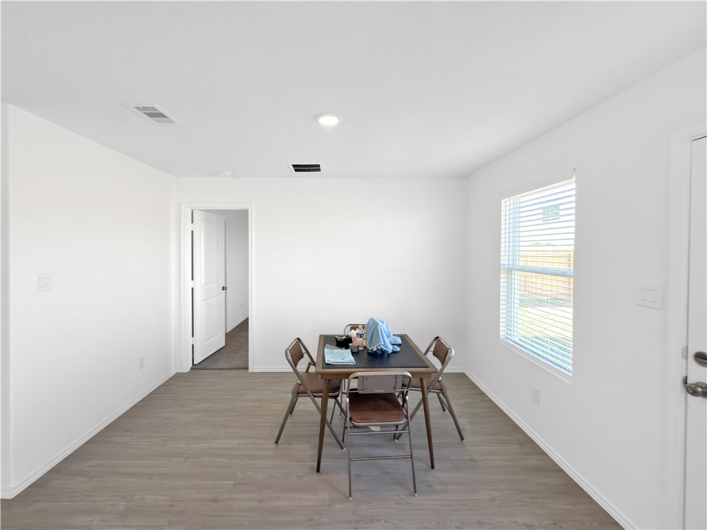 9238 Wilde Way Corpus Christi, TX 78410 - Photo 11 of 26 a workspace room with furniture and window