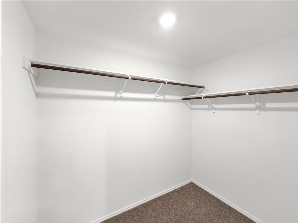 9238 Wilde Way Corpus Christi, TX 78410 - Photo 16 of 26 a view of a room with racks on the wall