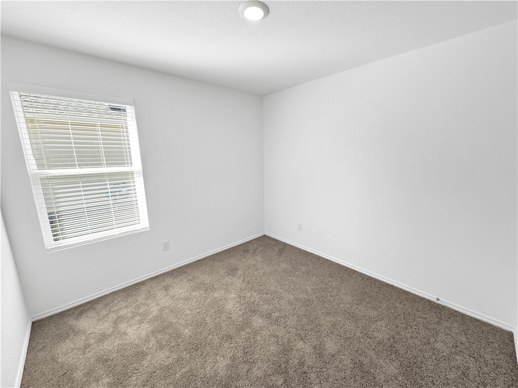 9238 Wilde Way Corpus Christi, TX 78410 - Photo 21 of 26 an empty room with a window