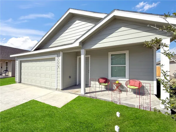 a front view of house with yard