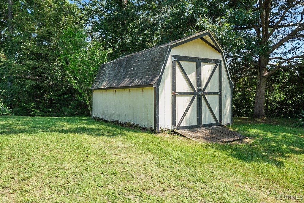 275 Station Road Charlotte Court House, VA 23923 - Photo 31 of 33 View of outdoor structure featuring a lawn