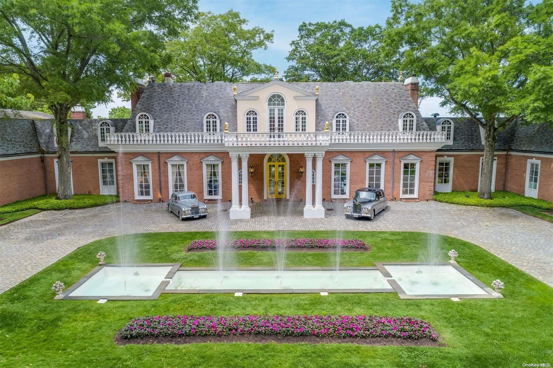 385 Oyster Bay Road Mill Neck, NY 11765 - Photo 1 of 1 a view of a house with swimming pool and a yard