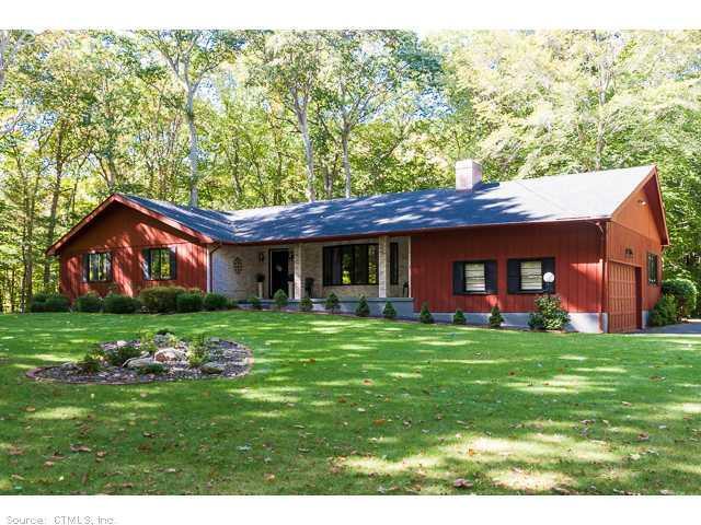 38 Eastwood Road Madison, CT 06443 - Photo 1 of 1 a view of a house with a yard and sitting area