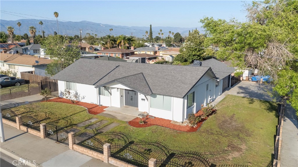 635 North Riverside Avenue Rialto, CA 92376 - Photo 1 of 1 a aerial view of a house with a yard