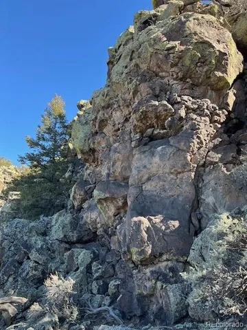 a view of mountain view with mountains in the background