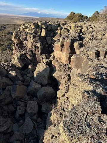 a view of a city of mountains with sky view