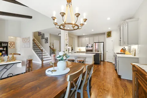 a kitchen with a sink and refrigerator