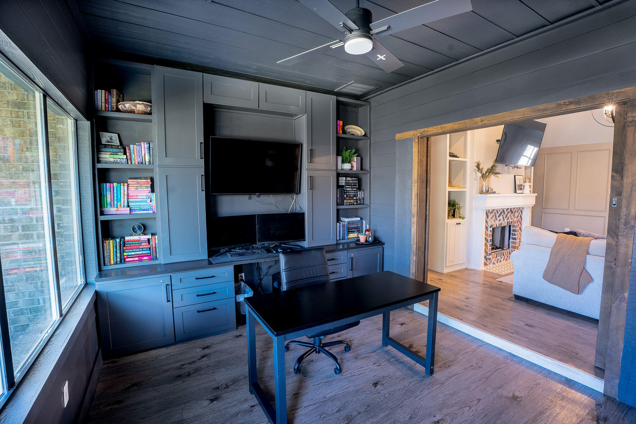 3436 125th Street Lubbock, TX 79423 - Photo 8 of 22 a reading room with furniture wooden floor and a bookshelf