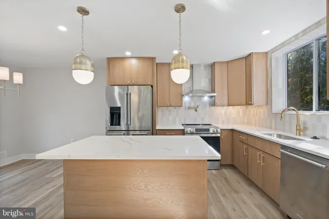 a kitchen with sink cabinets and window