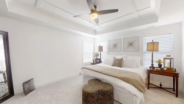a bathroom with a granite countertop sink mirror and shower