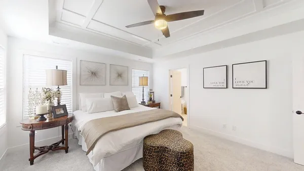 a bathroom with a tub and a shower