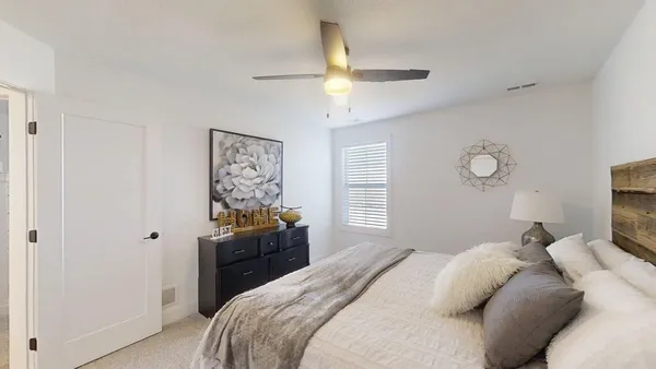 a living room with furniture pool and a table