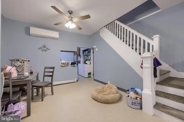 a bathroom with a toilet and a sink