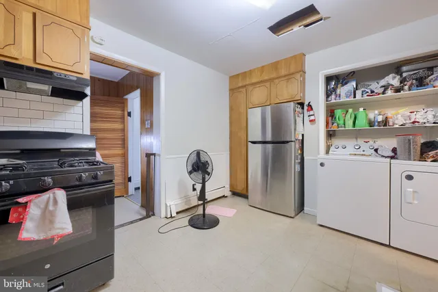 a bathroom with a sink vanity and a mirror