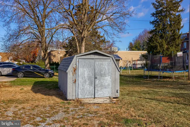 a kitchen with stainless steel appliances a refrigerator sink and cabinets