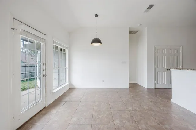 a view of a room with sliding glass door