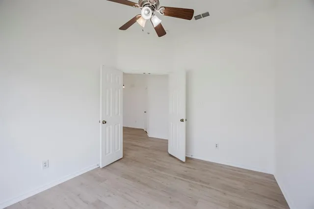a view of an empty room and window