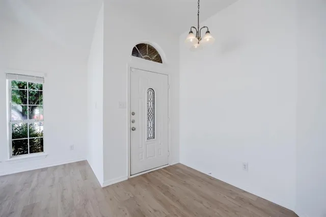 an empty room with windows