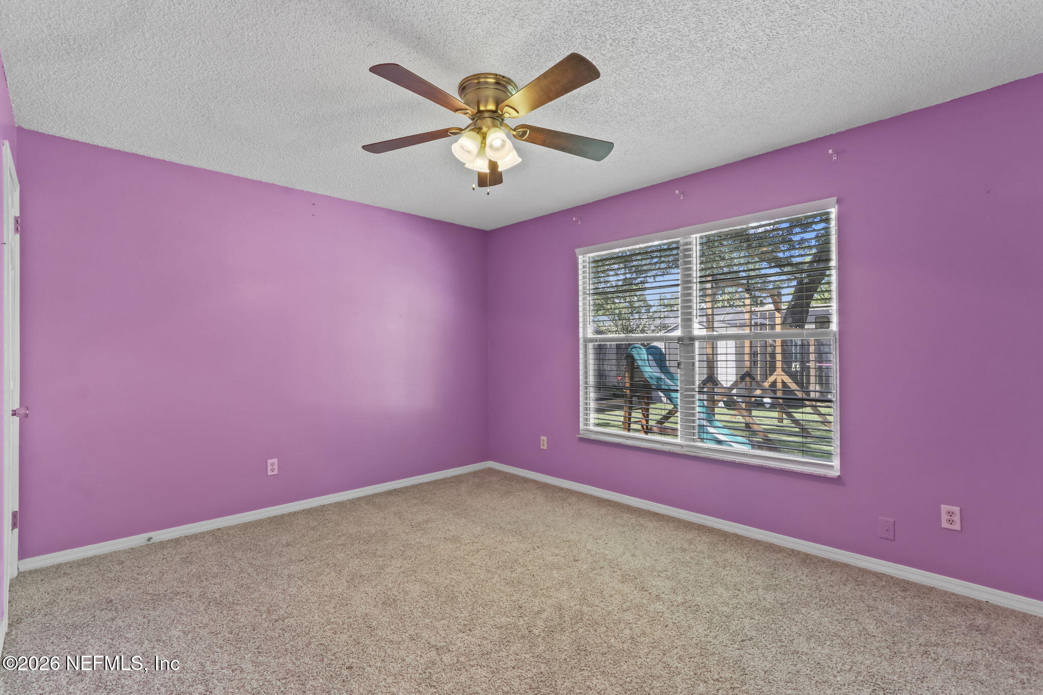120 Vanderford Road North Orange Park, FL 32073 - Photo 20 of 40 an empty room with windows and fan