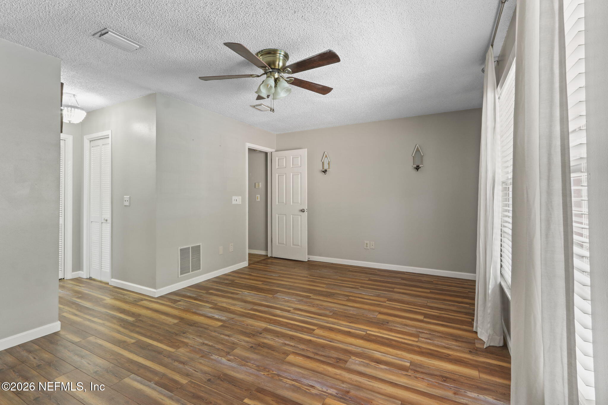 120 Vanderford Road North Orange Park, FL 32073 - Photo 23 of 40 a view of a room with a ceiling fan