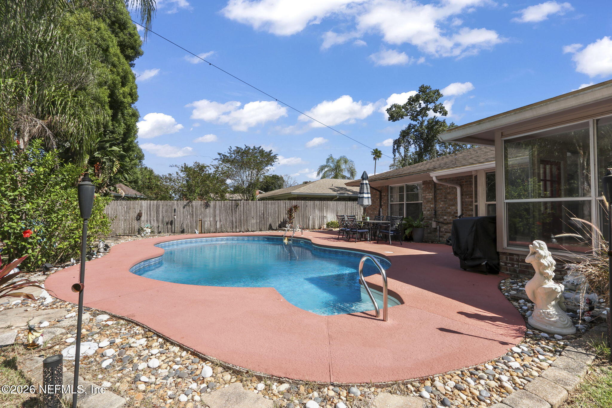 120 Vanderford Road North Orange Park, FL 32073 - Photo 33 of 40 a view of a swimming pool with a patio