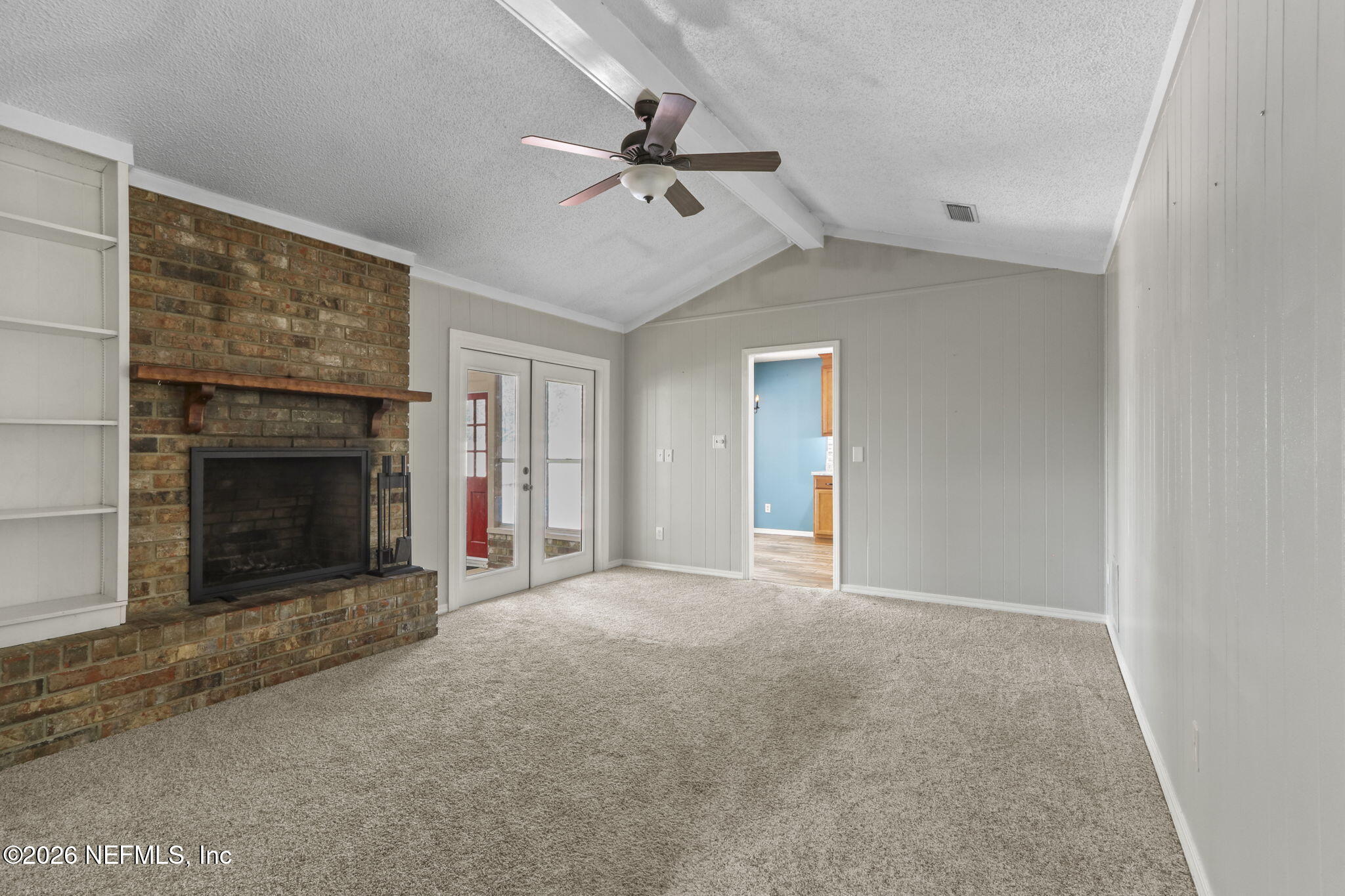 120 Vanderford Road North Orange Park, FL 32073 - Photo 7 of 40 a view of an empty room with a fireplace