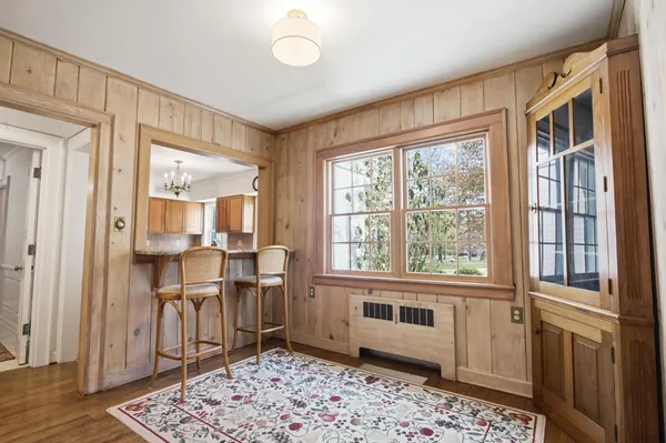 a kitchen with stainless steel appliances granite countertop a stove top oven a sink dishwasher and a refrigerator