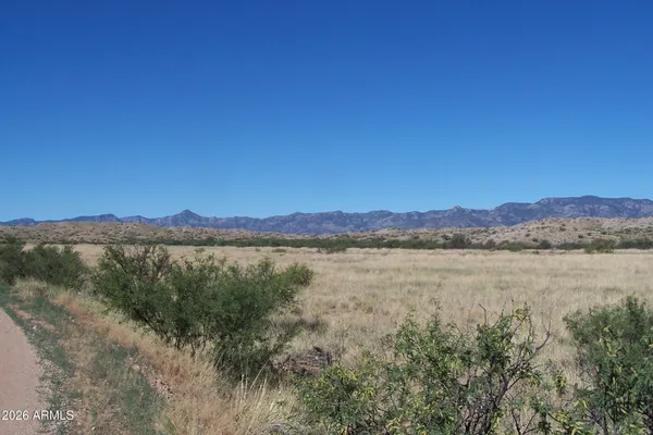 a view of lake and mountain