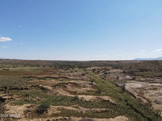 an aerial view of residential building and ocean
